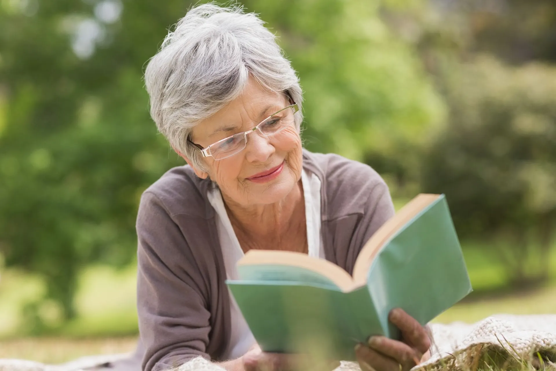 The Birches at Villa Rica - Senior Woman Holding a Book Reading