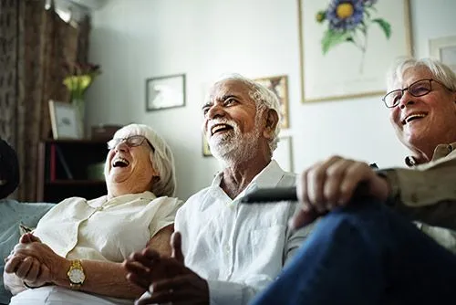 The Birches at Villa Rica - Seniors Enjoying while Watching the TV